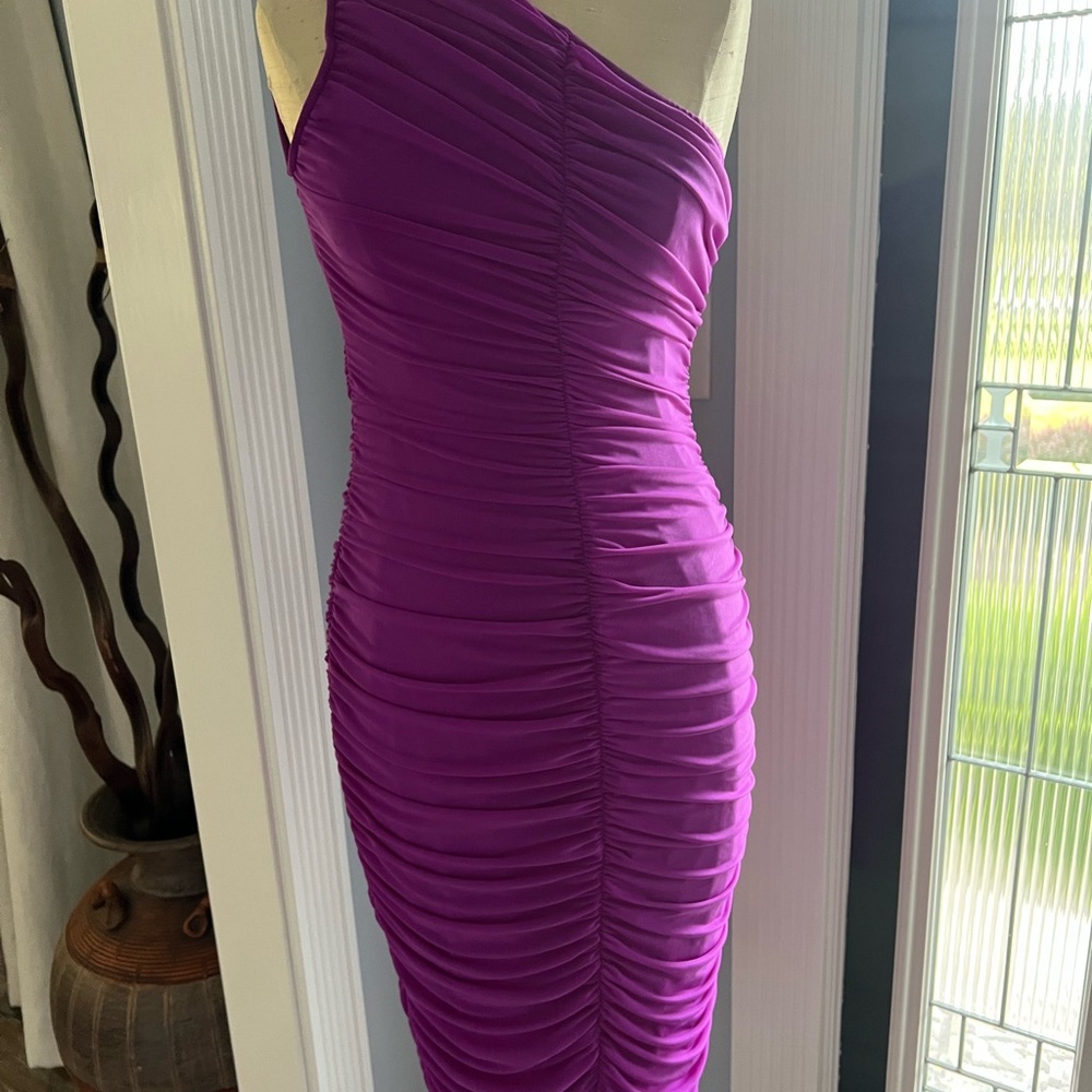 Large Women’s sexy dress. Fits like medium. Never worn